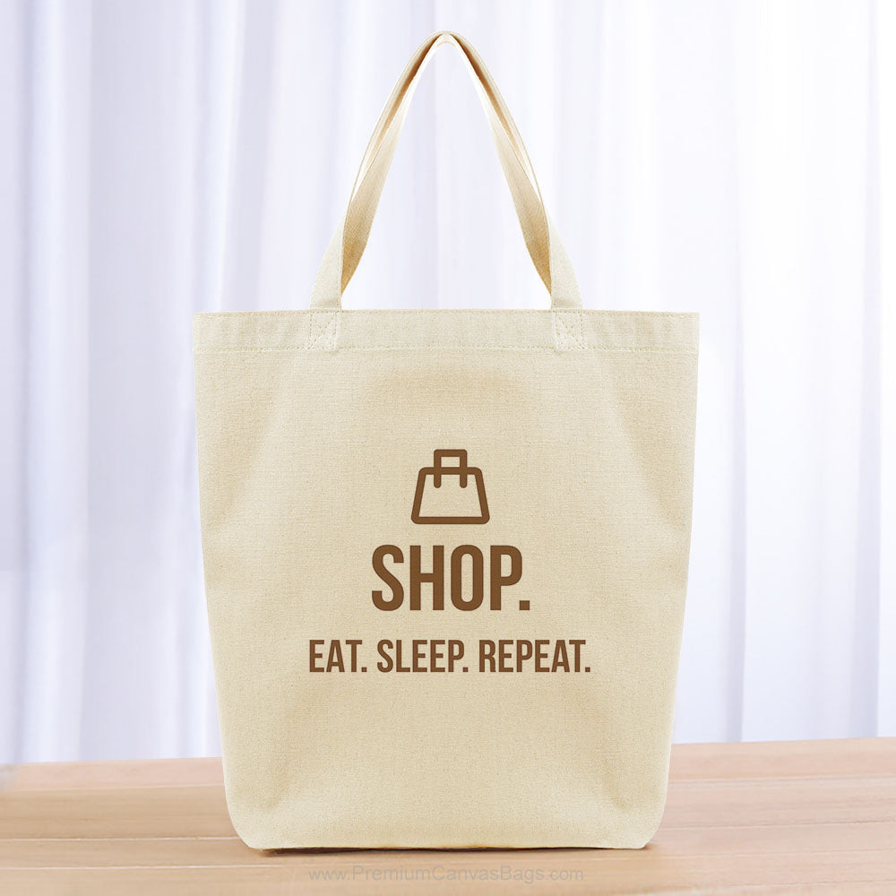 Shop Eat Sleep Repeat Tote Bag - brown