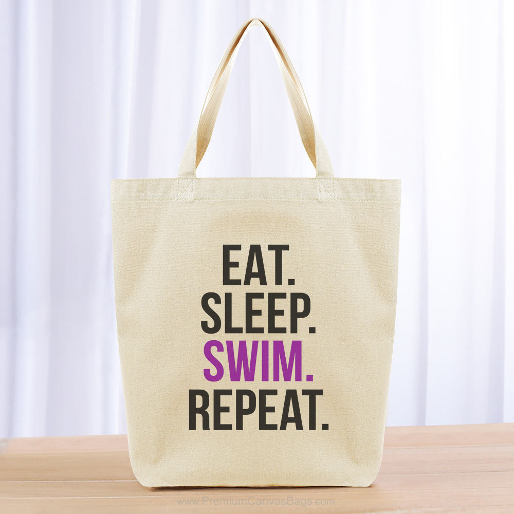 Eat Sleep Swim Repeat Tote Bag - black purple